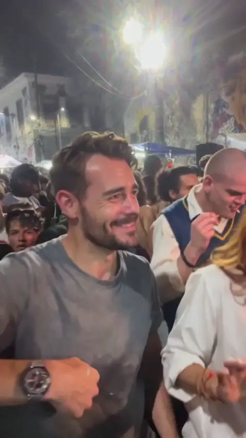 AI remake · grey-shirt lead in the Rio crowd
